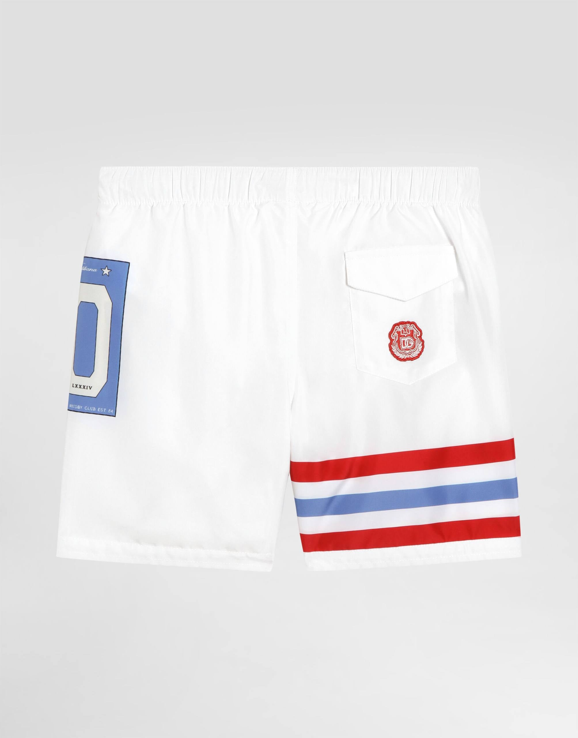 SWIM SHORTS WITH STRIPED DETAILS AND PATCHES