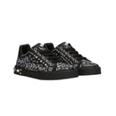 low-top graffiti sneakers in black and white